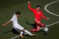 MADRID, SPAIN - MARCH 08: Achraf Hakimi (L) of Real Madrid CF competes for the ball with Pedro Rodrigues (R) of SL Benfica during the UEFA Youth League Quarter Finals match between  Real Madrid CF and SL Benfica at Estadio Alfredo Di Stefano on March 8, 2016 in Madrid, Spain.  (Photo by Gonzalo Arroyo Moreno/Getty Images)